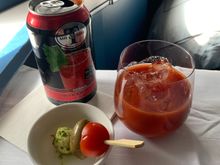 First is the drink service from the cart with an amuse-bouche of cheese/olive/tomato
