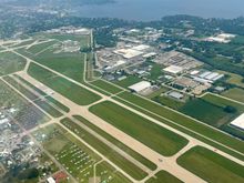 Runway 18/36 at Oshkosh; looking north east as we fly south. Lake Winnebago in the distance 