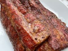 Rack of baby back ribs, salt and pepper dry rubbed, and smoked in the pizza oven over mesquite and cherry wood for 3 hours. Great smoke flavor and color and tender and moist. Happy Friday!