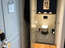 View on entry door and the extra toilet