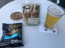 
For the most part the food selection hasn’t improved. If you want your carbohydrate fix this is the place to get it.

I had the Caesar salad wrap, a cold brew and a chocolate chip cookie. I didn’t end up eating the pita chips. 
