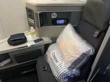 Casper seat cover, duvet, pillow and basic amenity kit. 