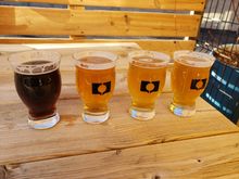 A flight of beers at a brewery with an FTer in town. For the record these are small glasses (5 fl oz) not full pints. 