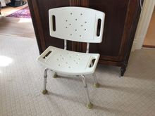 Adjustable shower stool for the impaired