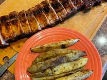 Grilled baby back cribs and crispy potato wedges