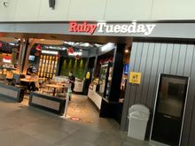 The lounge is opposite Ruby Tuesday.
