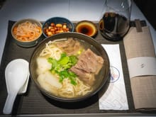 Double boiled beef noodle soup. Incredible broth and a huge amount of beef, one of the best inflight noodle dishes I've had.
