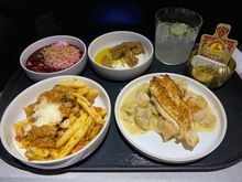 Clockwise from top middle - burrata, roasted chicken, cavatelli, and vanilla gelato