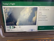 Flying over snow capped mountains and hills. 