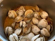Portuguese clams. Linguica, onions, white wine, and the last batch's strained broth.