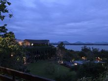 A view from the Townhill bar area towards the lake and pool in the early evening.