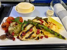 Grilled halloumi with baba ghanoush, houmous, asparagus and stuffed vine leaves.