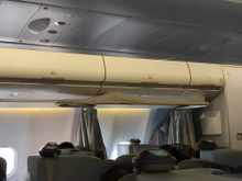 A remnant from AB days is the last seat in the J cabin which was also the crew rest as denoted by the curtain. 