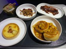 Coconut yogurt, maple blazed bacon, quinoa pancakes, farm egg tart