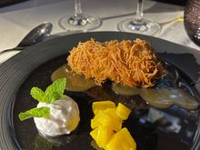 Deep fried banana with coconut sauce