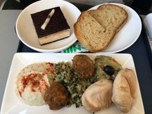 MAN - LCY    Arabic mezze (hummus, freekah salad, sweet potato felalfels, baba ganoush and mini pittas).  This was absolutely delicious, only let down by the pittas which were too cold.    I very nearly missed it all together as my boarding pass wrongly said gate 44 whereas the flight left from gate 144.   I pointed this out as we boarded last with a few mins to spare and was told “oh it does that sometimes” (!)