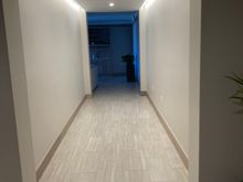 Hallway/corridor into suite. 