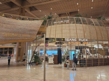 View from airside area -- you can see the two level restaurant, top level in the 080 lounge and the bottom one in the standard airside area.
