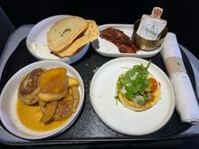 Smoked salmon, maple glazed bacon, frittata, and farro pancakes

