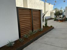 Various courtyard rooms and suites around the second floor have a small private outdoor area which is enclosed by a fence like this.
