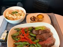 Beef salad served with 80 minutes left in the flight 
