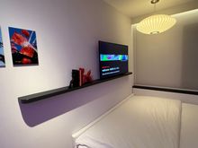 I found the bed to be comfy. Not having direct floor access on both sides might be bothersome if you are not staying alone.