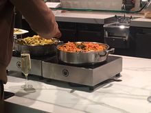 The veggie tagine and a pot of pasta. The area behind the food counter is not accessible to pax, just to staff who use it to replenish and keep area clean and tidy (much welcomed). On the other side of the kitchen is an area with a large table. Elsewhere seating hasn't changed much but some seating configurations have been refreshed.