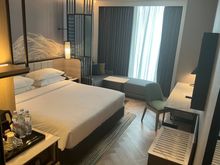 "1 king bed city view corner with 1 sofa bed"
