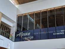 Putting the finishing touches on the new AS Lounge above gate N13 at SEA's North Satellite. Photo taken 7/2/19. Scheduled to open 7/12/19.