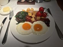Organic free range eggs - freshly scrambled, fried or boiled
Cumberland pork sausage, crispy pancetta, spinach stuffed portobello mushroom, roasted cherry tomatoes, breakfast potatoes