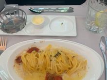 I was in 6E and they ran out of beef cheeks when it was my turn. My husband in 6F was able to order them. The pasta was very oily. 