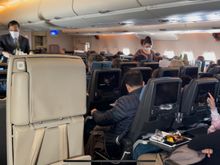 Meal service was still in swing downstairs in the economy cabin
