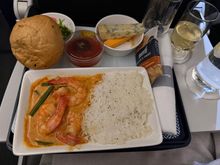 Slightly delayed departure. Decent crew, tasty starter and prawn curry with plenty of champagne and red wine provided. No menus provided on this flight which would have completed the finishing touch.