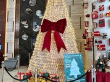 Lobby level Christmas tree made with 2500+ water bottles, looks like the bottles they have in the room.