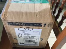 Arrived safely and looking like it had a special place in the UPS sleigh. I announced it's arrival and mini ahopkins767 was summoned to do the opening. 