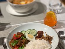 Nasi lemak with beef rendang. Rice wasn’t as fragrant as Punggol nasi lemak. Waiter came by to ask if the rendang, “tamed down for westerners’ taste buds” was still flavourful enough. It was. 
