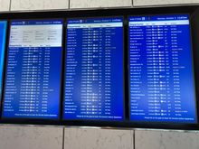 The lounge has a departures board but no calls are being made, except the call that people should offer their extra seats as the lounge was getting at capacity 