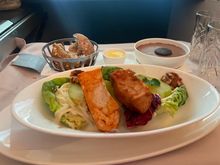 I meant to order the chicken pie, but didn’t realize there were 2 chicken dishes, so saying “chicken” ended up with this. To be fair, the flight attendant did say something about salad when confirming my order but I was a bit distracted. However, I really enjoyed it. Chicken was very flavourful. It was a nice light meal. 
Chocolate mouse was also delicious (but when is it not). 