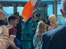 The crew waving the Irish flag to a huge applause 