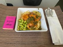 Red Curry Chicken over noodles with edamame and lime.