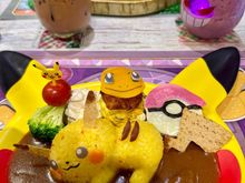 My (Pikachu) plate contained a small hamburger slab of chicken. The Snorlax plate in the background was chicken and rice.