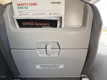 Seat back pocket and safety card 