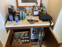 Stocked minibar with Nespresso capsule machine 