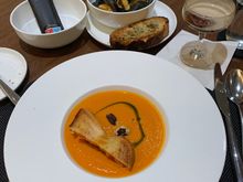 Yellow tomato bisque soup