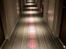the hallway corridors to the rooms (I liked the waveform pattern on the floor)