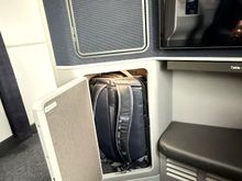 Backpack storage easily fits 30L backpacks. 