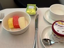 Sliced fruits, Haagen Dazs ice cream, tea