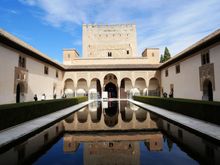 Courtyard. Entrance to the Throne Room and the monumental Comares Tower.  - The Court of Myrtles.