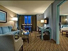 Executive Suite. Experience true comfort by reserving our upgraded Executive Suite. This inviting guest room offers a large parlor area with a bedroom attached and all the modern conveniences of the Standard Room plus a microwave and refrigerator.