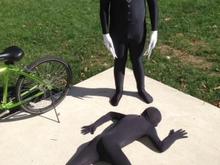 10262014 Daeton in black morph suit on ground and Tony in slenderman suit